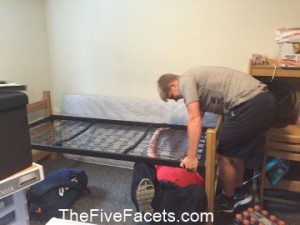 Big Guy & Warren Raising the Dorm room bed